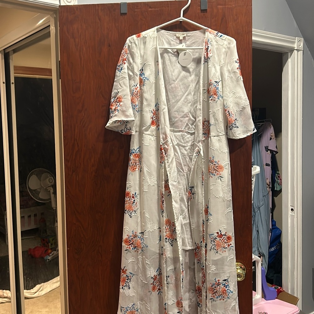 En crème maxi wrap around dress